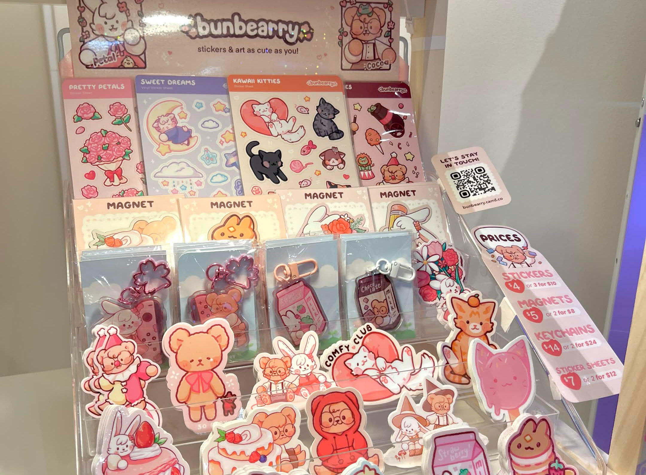 Kingsway Makers Community Shelf - Bunbearry Bunbearry's 1ft shelf display at Kingsway Maker's Community Shelf. An acrylic display showing sticker sheets, magnets, keychains, and stickers.